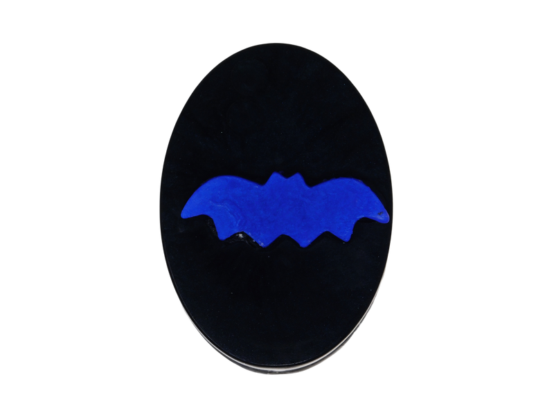 black oval soap with purple bat