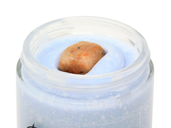 top view of the sunstone crystal on top of celestial body butter.