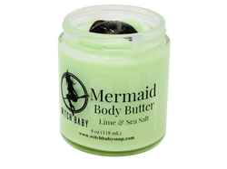 green body butter in 4 oz glass jar topped with sea jasper with label that reads: Mermaid Body Butter. Lime & Sea Salt.