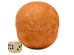 gold glitter covered sphere shaped bath bomb with jade dice