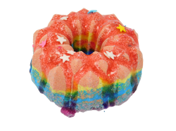 leo birthday cake shaped like a bundt cake in rainbow colors with soapy glaze and rainbow star sprinkles,