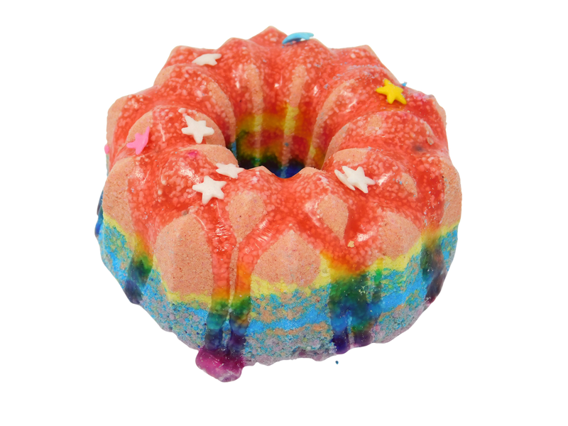 leo birthday cake shaped like a bundt cake in rainbow colors with soapy glaze and rainbow star sprinkles,