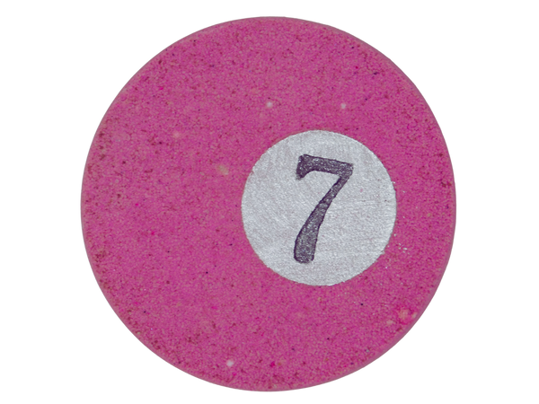 circular bath bomb fashioned to look like a pink #7 pool ball