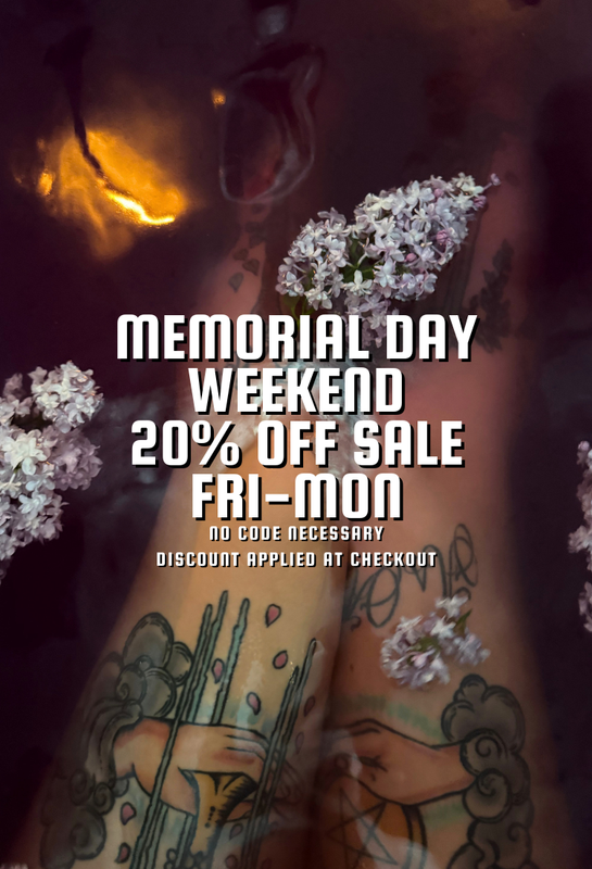 Promotional graphic for Memorial Day weekend sale with tattoos and flowers on a dark background.