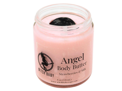 pink body butter packaged in  4 oz glass jar topped with rhodonite with a clear label that says "Angel Body Butter. Strawberries & Milk."