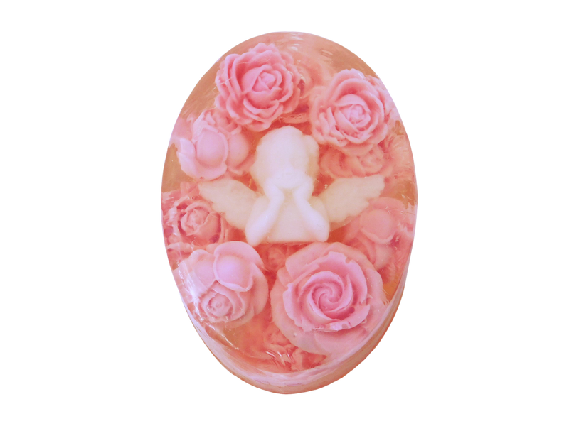 oval soap with white baby cherub in the center surrounded by pink roses