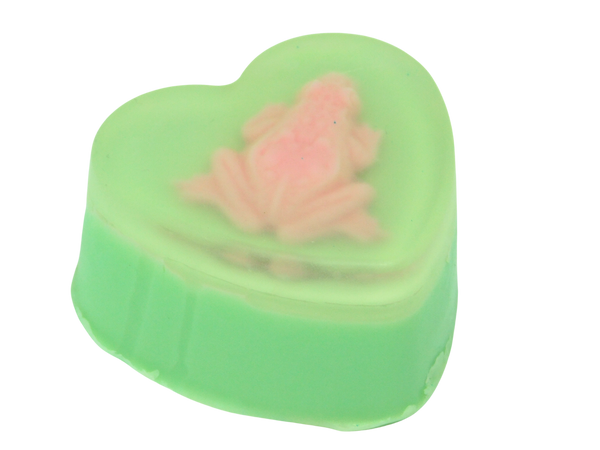 side view of pastel green green heart with pastel pink frog embedded on top