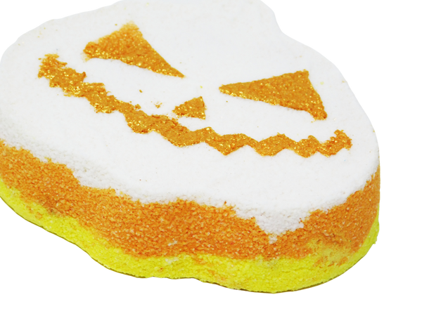 side view of bath bomb showing candy corn colored layers