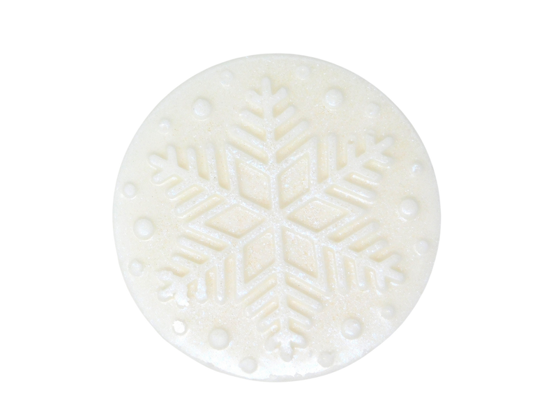 Snow white glitter covered Sparkling Snow shea butter soap displayed on a white background with the design of a snowflake on top 