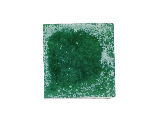 square green soap with salt on top