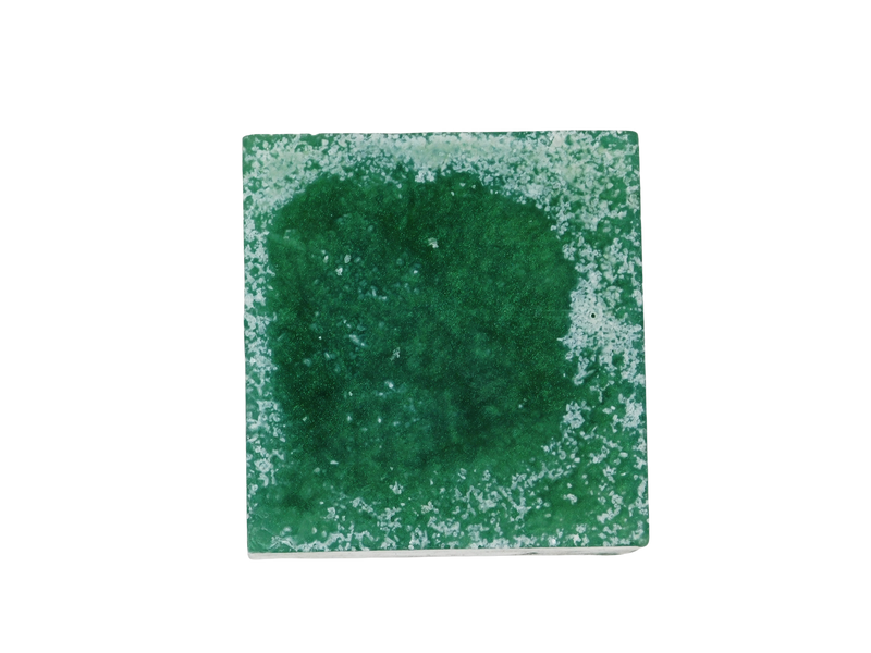 square green soap with salt on top