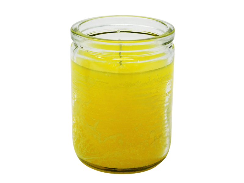 yellow candle in glass jar